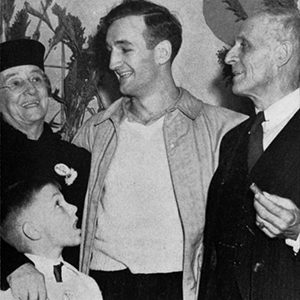 U-M football star Tom Harmon with his parents, 1940. (Image: Bentley Historical Library.)