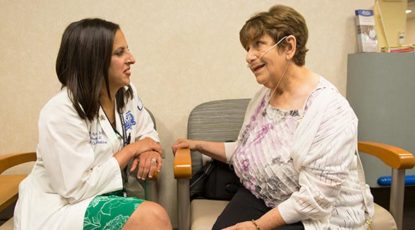 Rana Awdish with patient.