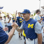 Coach Bakich shakes hands