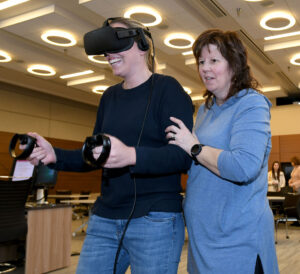 Nurses navigate VR technology.