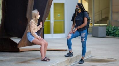 students wear masks on campus