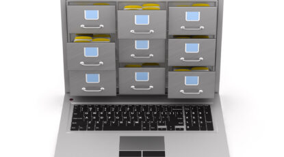 Laptop with filing cabinet on white background. Isolated 3D illustration.