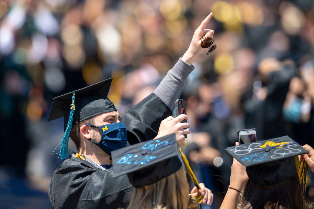 Guy celebrates graduation