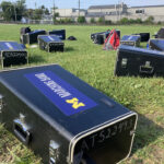 Michigan Marching Band equipment on the ground