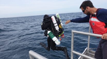 Researcher jumps into Lake Huron