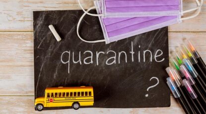 A chalkboard with the word "Quarantine" written on it.