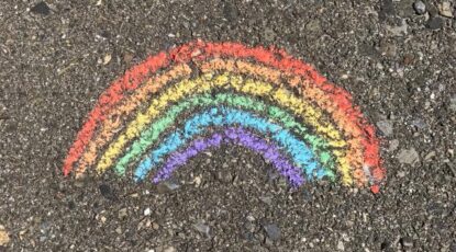 Rainbow drawn in chalk on the cement