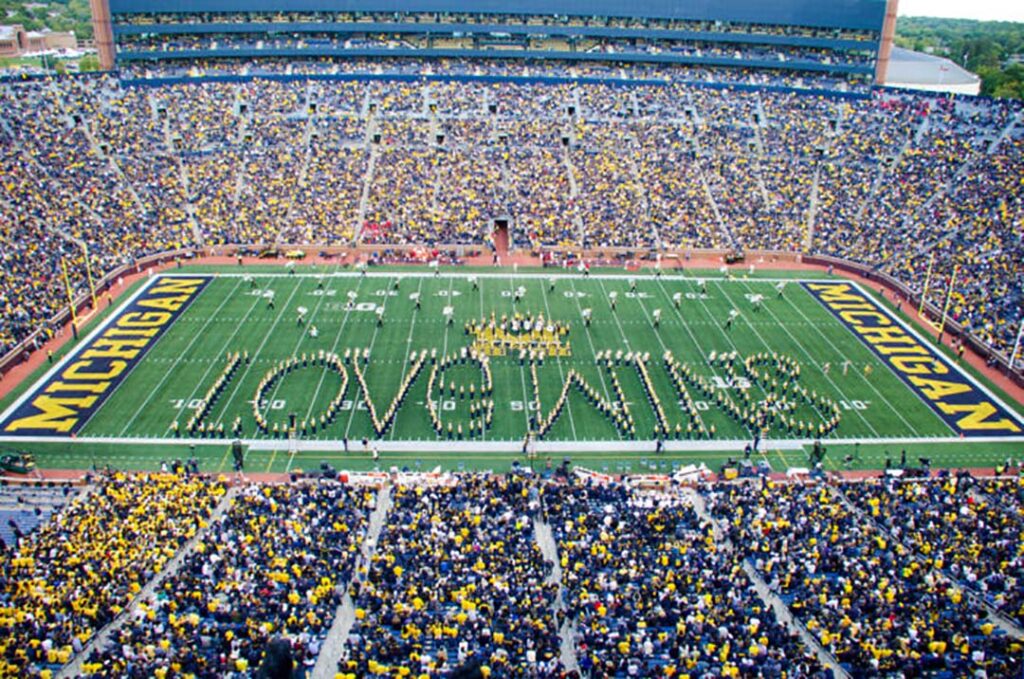 Marching band forms the words Love Wins