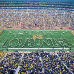 Marching band forms the words Love Wins