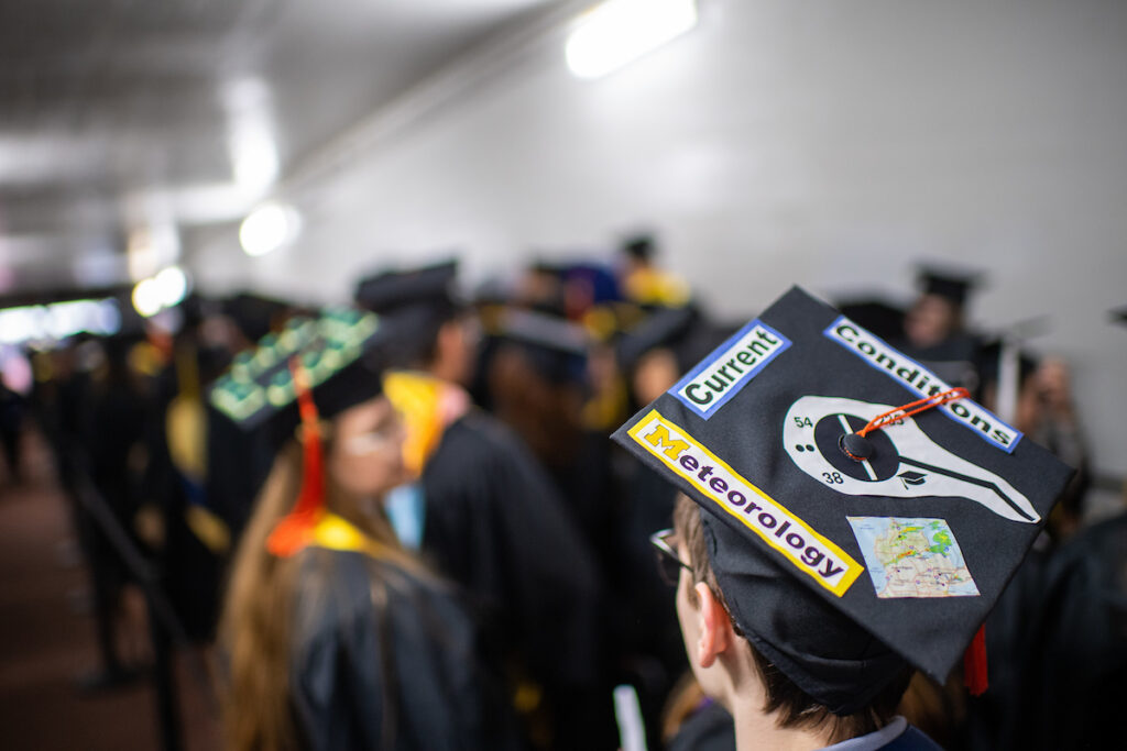 Commencement cap reads: Meteorology, current conditions