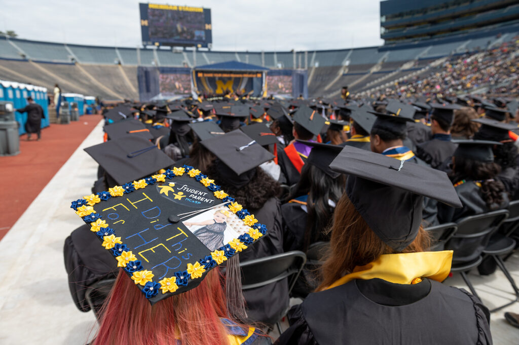 Cap reads: Student parent: I did it for her