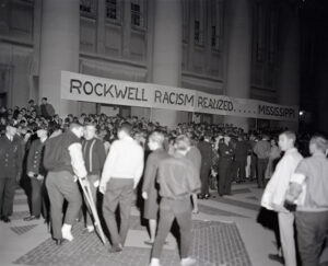 Protesters strung a banner across Hill's facade that equated Rockwell with Jim Crow rule in the American south.