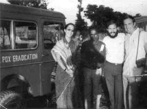 Doctors in 1974 with jeep that reads pox eradication