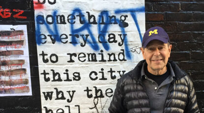 Jim Dale at Manhattan bookstore with graffiti