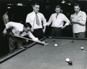 Men play Billiards in the Michigan Union.