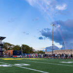 A deserted Elbel Field with a rainbow