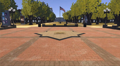 Image of the Block M on the Michigan Diag with a long view toward the flagpole near the Michigan League.