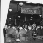 A view into the Pretzel Bell from outside the window. Black & white.