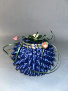 Basket titled Blueberry Blossom, created with black ash matieral.