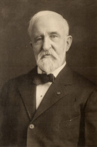 Portrait of an elderly caucasian man at the turn of the 20th century.