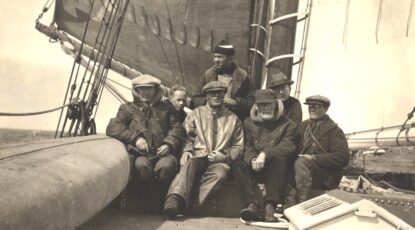 Explorers, circa 1920s, aboard a ship en route to Greenland.