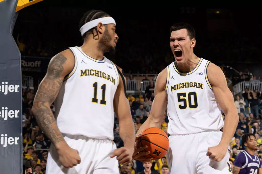 Vladislav Goldin and Roddy Gayle Jr. celebrate a sweet score against Northwestern.