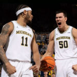 Vladislav Goldin and Roddy Gayle Jr. celebrate a sweet score against Northwestern.