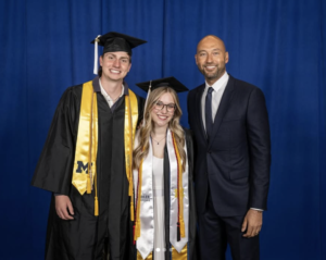 Alumni with Derek Jeter.