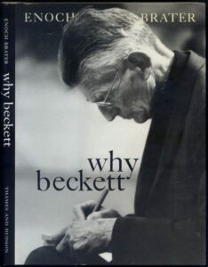 Cover of Enoch Brater book called Why Beckett. Black and white image of Beckett in profile bent over a piece of writing with pen in hand.