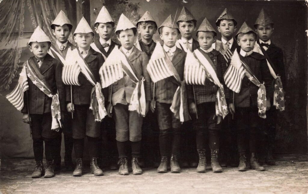 Boys of 2nd and 3rd Grades in Flag Drill, 1906 - '07. Image credit: David V. Tinder Collection of Michigan Photography, University of Michigan William L. Clements Library.