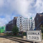 View of the Central Campus Housing Complex construction with view of the railroad tracks.