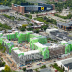 Aerial view of Central Campus Housing Project under construction with view of Michigan Stadium and Crisler Stadium.