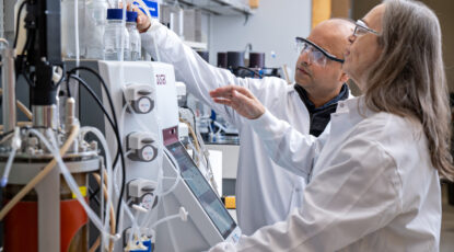 University of Michigan's NPDC director Ashu Tripathi, Ph.D., and lab specialist Pam Schultz monitor fermentation processes for microbes in the Natural Products Discovery Core. (Image credit: Leisa Thompson, Michigan Photography.)