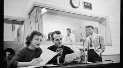 Black and white image aof staff t WUOM at University of Michigan, Ann Arbor, 1949, by Stanley Kubrick.