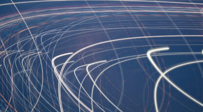 Abstract graphic suggests data streams swirling through space.
