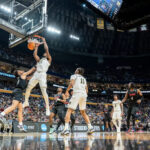U-M basketball player Morez Johnson sinks a basket during the 2026 NCAA championship tournament.