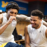 U-M Basketball players Lendeborg and McKenney share a laugh in the lockerroom during the 2026 NCAA national championship.
