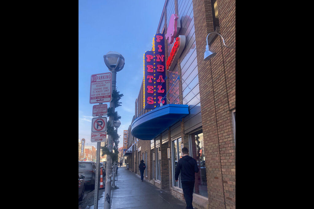 Pinball Pete's neon sign on Liberty Avenue in Ann Arbor, Michigan, its new location.