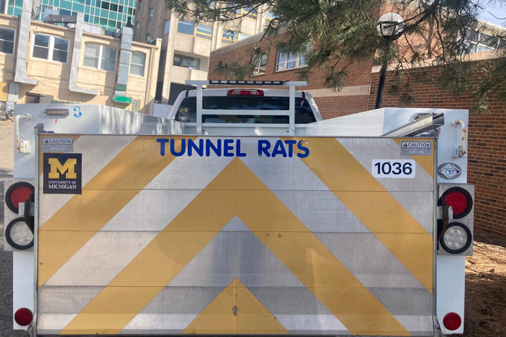 Truck parked at University of Michigan has a tailgate with the words painted: Tunnel Rats.