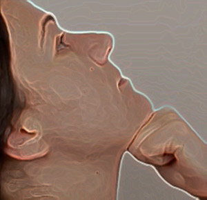 Caucasian person tilts head back with hand in a fist under the chin.