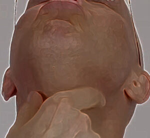 Cacuasian man tilts head back and touches neck skin.
