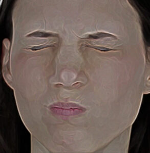 Graphic of a female squinching up her face.