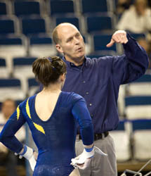 Assistant coach Scott Sherman, a former National Assistant Coach of the Year, is an invaluable advisor, especially on the uneven bars and vault. (Photo: Scott Soderberg, U-M Photo Services.)