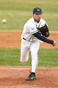 University of Michigan pitcher Zach Putnam throwing a fast ball