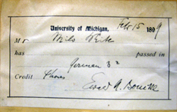 handwritten grade sheet of a Milo White showing he passed his course in German in 1899.