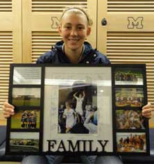 Hein with a poster that her teammates made for her. 