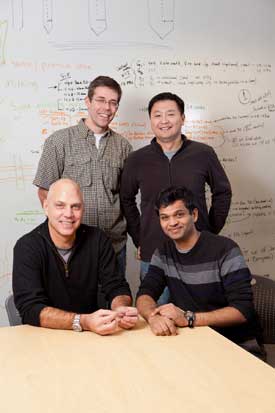 Daryl Kipke leads a team of U-M alumni in the high-tech startup company NeuroNexus (Clockwise from lower left: Kipke,  John Seymour, KC Kong, Hirak Parikh. Photo: Scott Soderberg, U-M Photo Services.) 