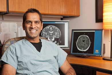 Dr. Parag Patil, who performed the surgery on Kevin Miller, says that DBS is 'like the oboe that begins a concert,' coordinating and tuning different parts of the brain. (Photo: Austin Thomason, U-M Photo Services.)