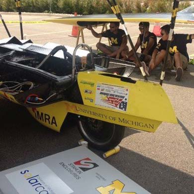 The team grabs some shade during a break in the action. (Photo: Laura Lessnau.)