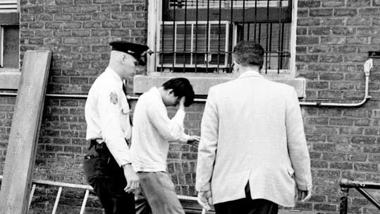 U-M student David Lim taken into police custody, 1959